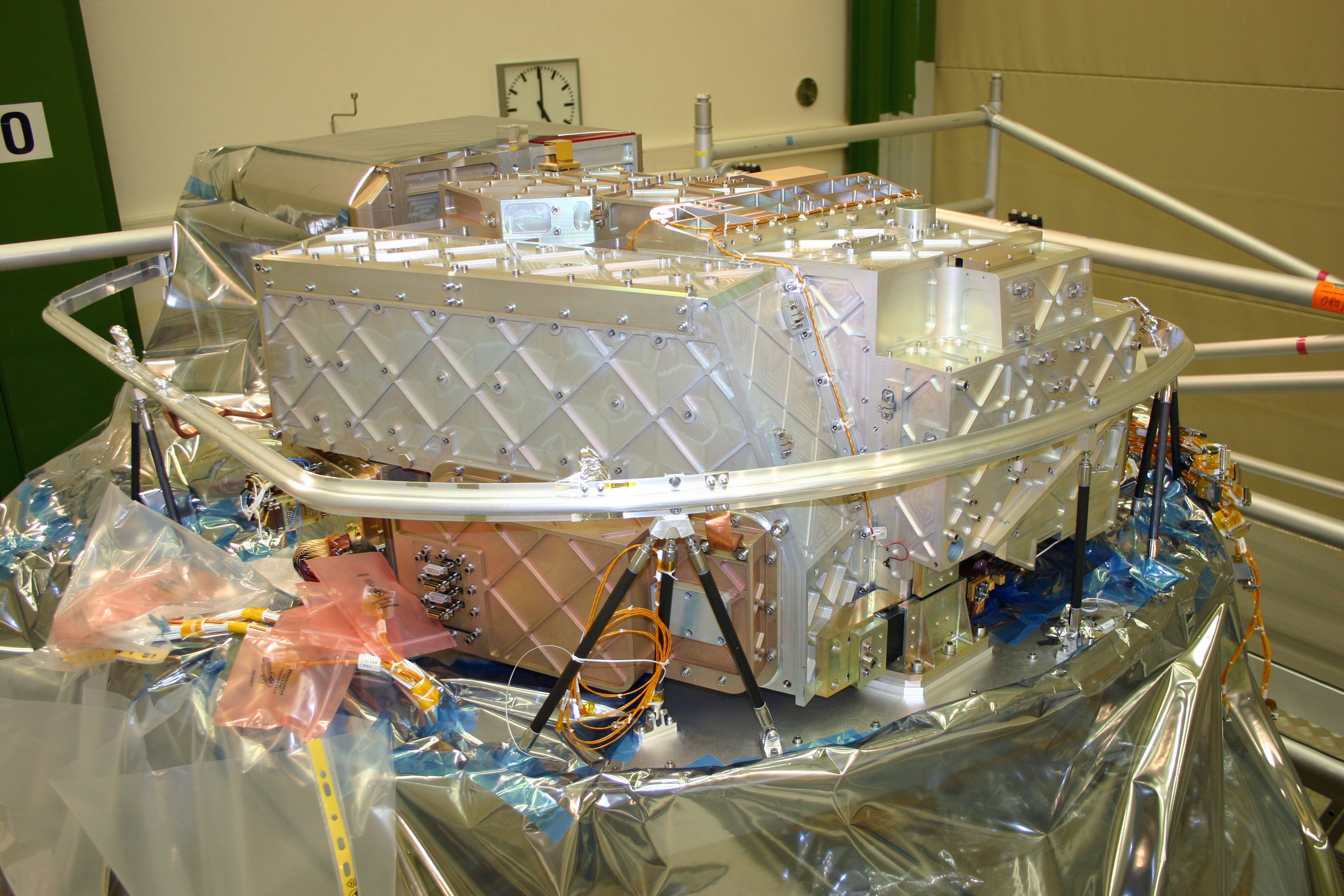 PACS FM FPU mounted on the Herschel flight cryostat optical bench in Astrium, Friedrichshafen, Germany. PACS FM FPU mounted on the Herschel flight cryostat optical bench in Astrium, Friedrichshafen, Germany.