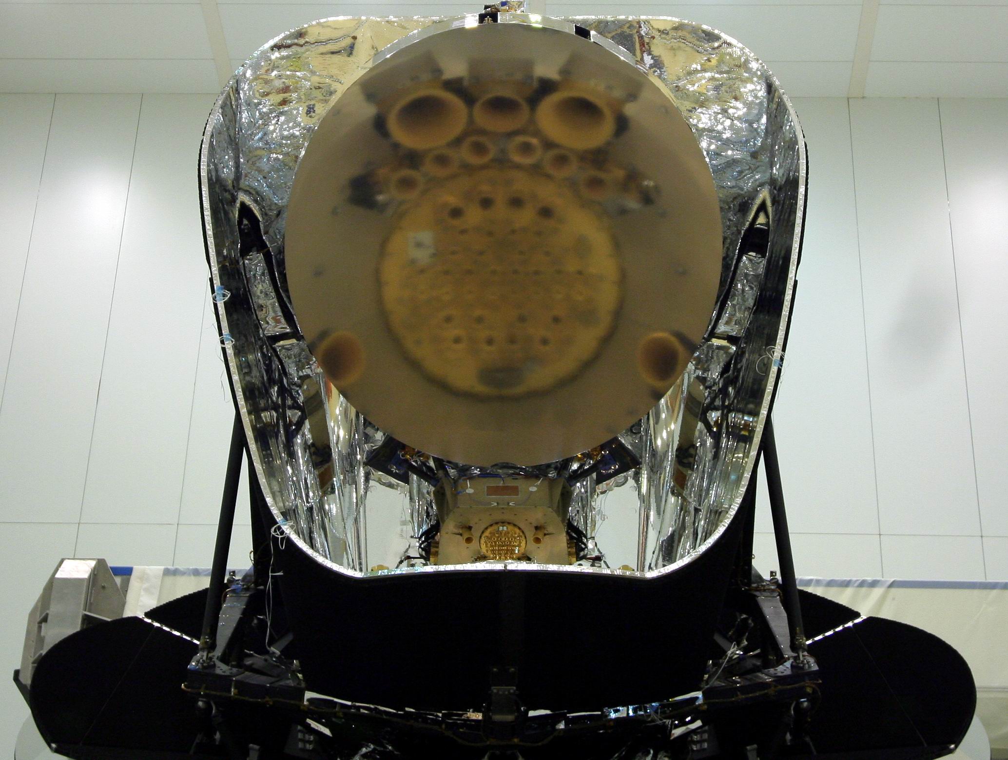 Planck Focal Plane Unit reflected in its primary mirror