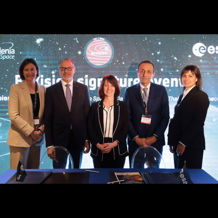 Five people standing. From left to right: ESA Envision Project Manager Anne Pacros, ESA Director General Josef Aschbacher, ESA Director of Science Carole Mundell, TAS Italia CEO and TAS Deputy CEO Giampiero Di Paolo and TAS Envision Project Manager Laura Costanza.